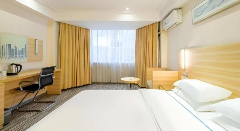 Bed in City Comfort Inn Guangzhou Luyuan Road Taojin Metro Station