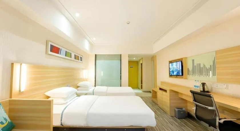 Bed in City Comfort Inn Guangzhou Luyuan Road Taojin Metro Station