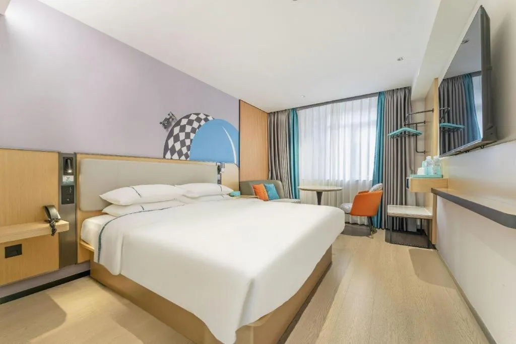 Bed in City Comfort Inn Guangzhou Luyuan Road Taojin Metro Station