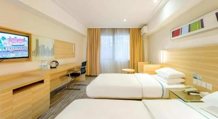 Bed in City Comfort Inn Guangzhou Luyuan Road Taojin Metro Station