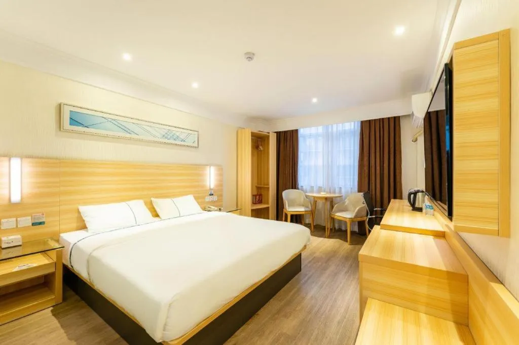 Bed in City Comfort Inn Guangzhou Luyuan Road Taojin Metro Station