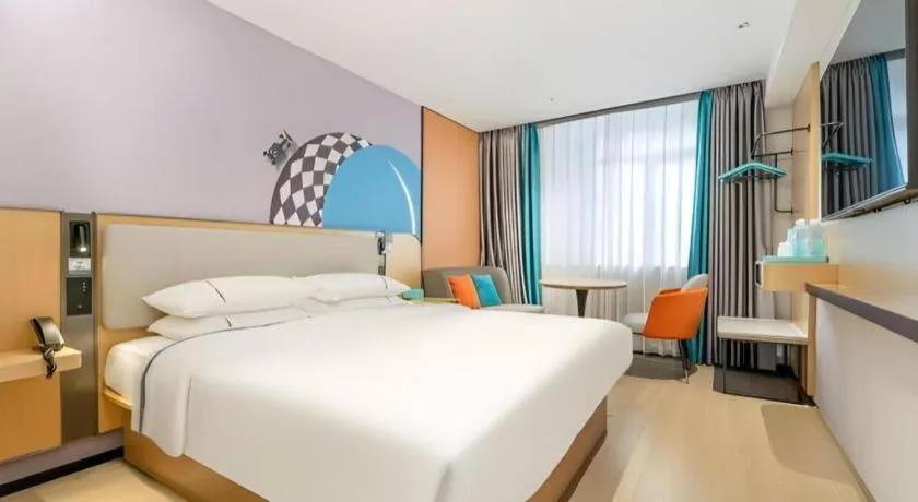 Bed in City Comfort Inn Guangzhou Luyuan Road Taojin Metro Station