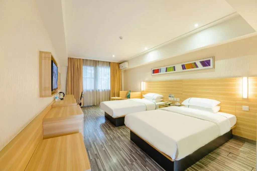 Bed in City Comfort Inn Guangzhou Luyuan Road Taojin Metro Station