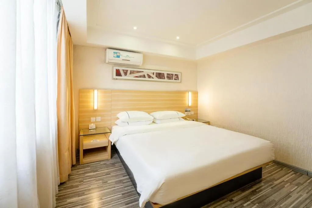 Bed in City Comfort Inn Guangzhou Luyuan Road Taojin Metro Station