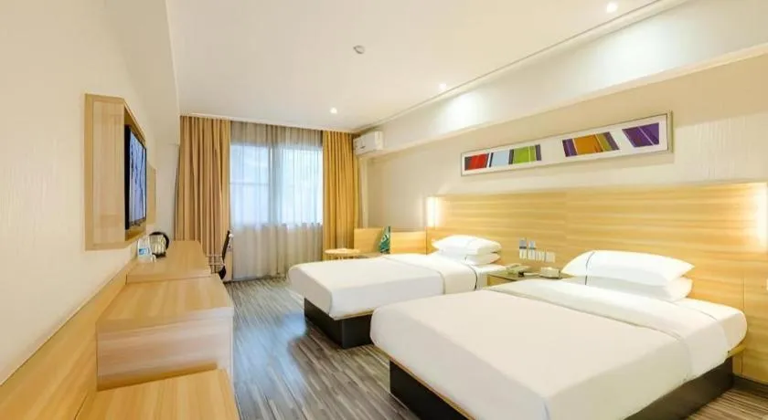 Bed in City Comfort Inn Guangzhou Luyuan Road Taojin Metro Station