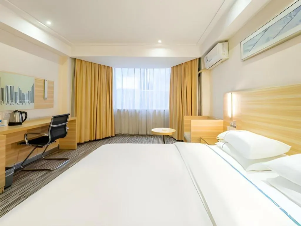 Bed in City Comfort Inn Guangzhou Luyuan Road Taojin Metro Station