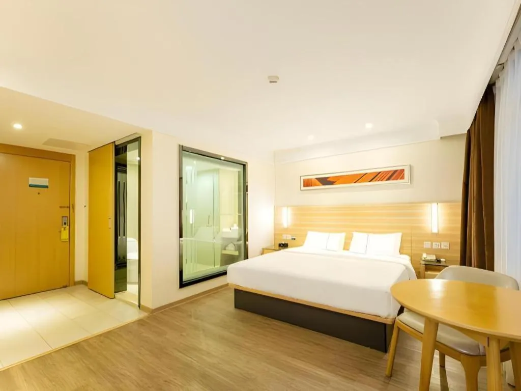 Bed in City Comfort Inn Guangzhou Luyuan Road Taojin Metro Station