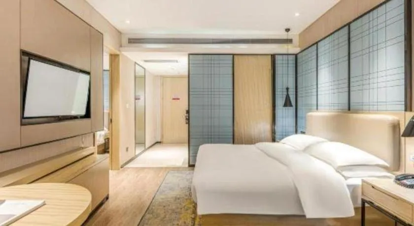Bed in Echarm Hotel Yiyang Wanda Plaza