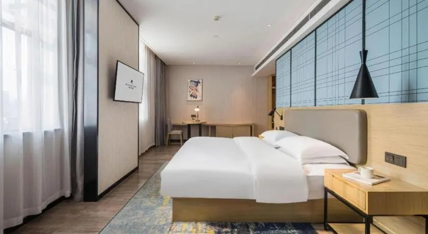 Bed in Echarm Hotel Yiyang Wanda Plaza