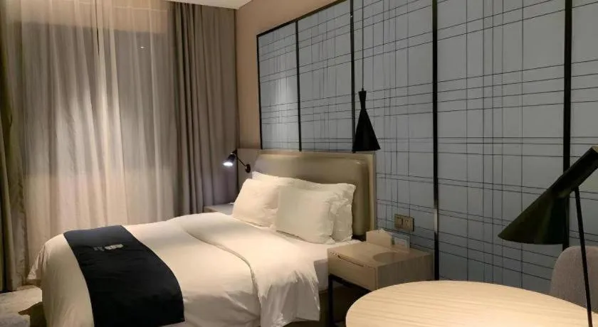 Bed in Echarm Hotel Yiyang Wanda Plaza