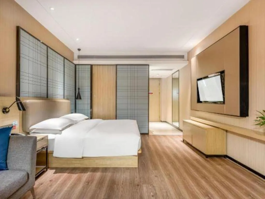 Bed in Echarm Hotel Yiyang Wanda Plaza