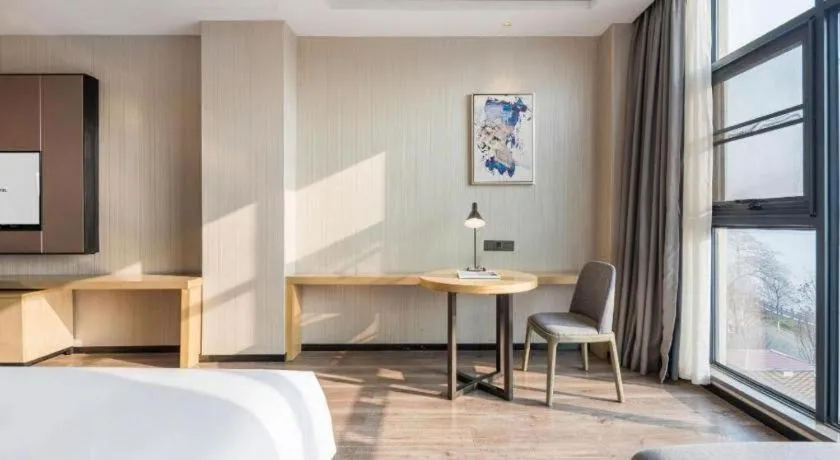 Bed in Echarm Hotel Yiyang Wanda Plaza