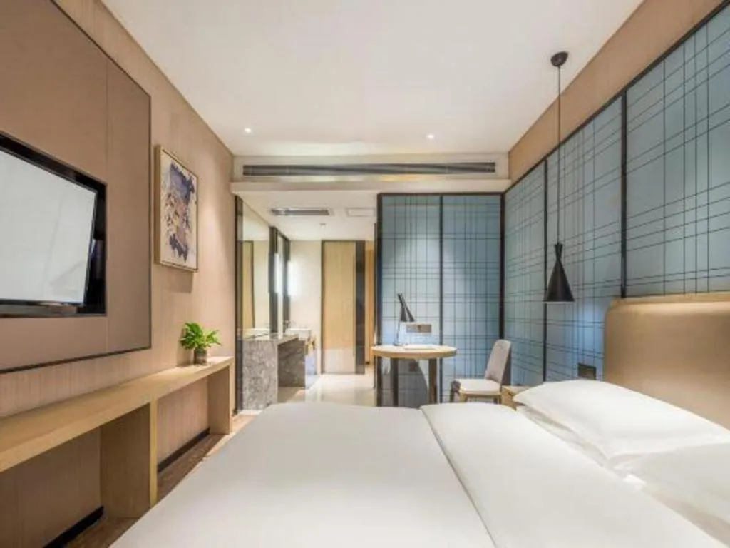 Bed in Echarm Hotel Yiyang Wanda Plaza