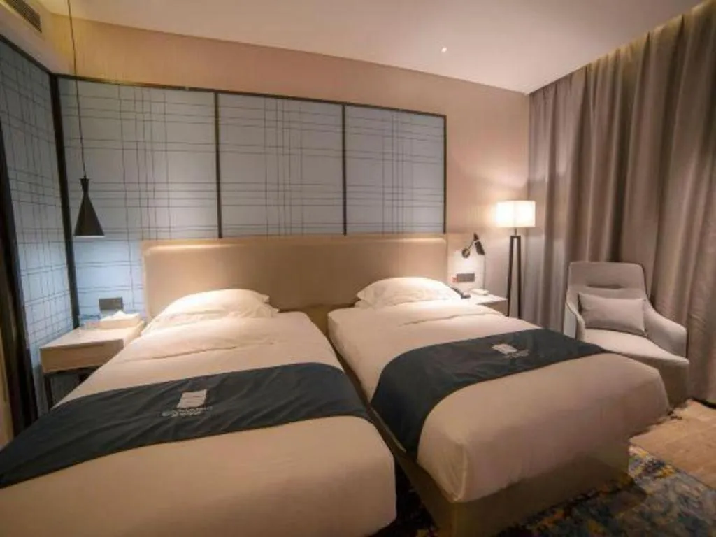 Bed in Echarm Hotel Yiyang Wanda Plaza