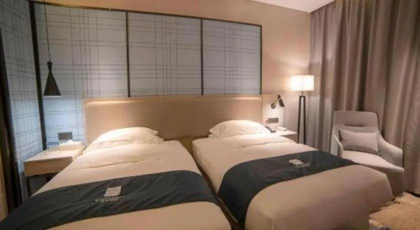 Bed in Echarm Hotel Yiyang Wanda Plaza