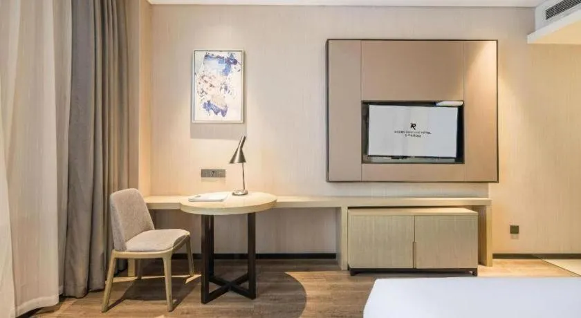 Bed in Echarm Hotel Yiyang Wanda Plaza