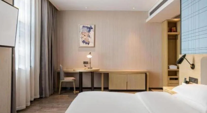 Bed in Echarm Hotel Yiyang Wanda Plaza