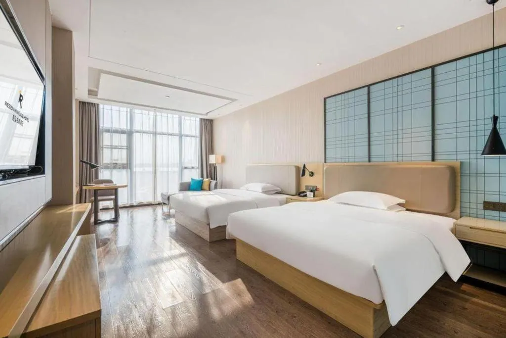 Bed in Echarm Hotel Yiyang Wanda Plaza