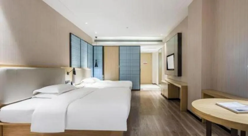 Bed in Echarm Hotel Yiyang Wanda Plaza