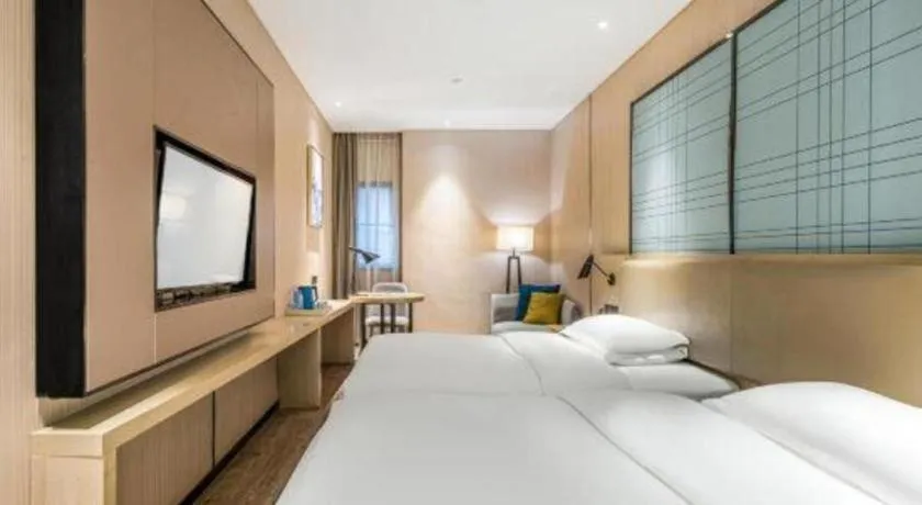 Bed in Echarm Hotel Yiyang Wanda Plaza