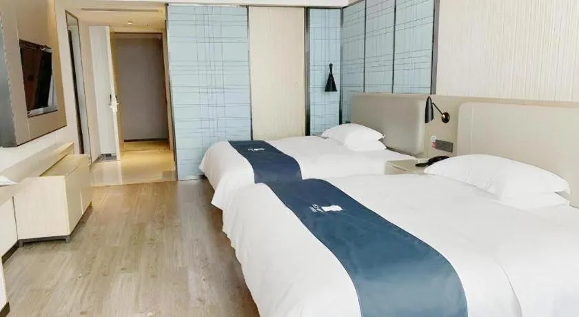 Bed in Echarm Hotel Yiyang Wanda Plaza