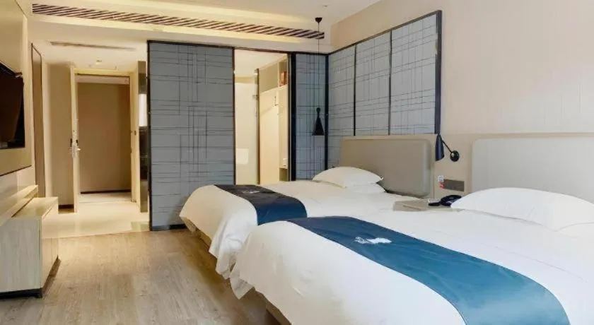 Bed in Echarm Hotel Yiyang Wanda Plaza