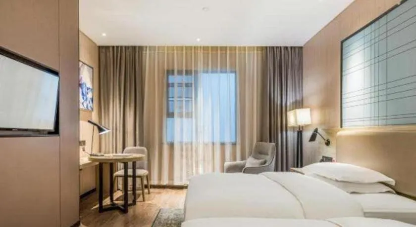 Bed in Echarm Hotel Yiyang Wanda Plaza