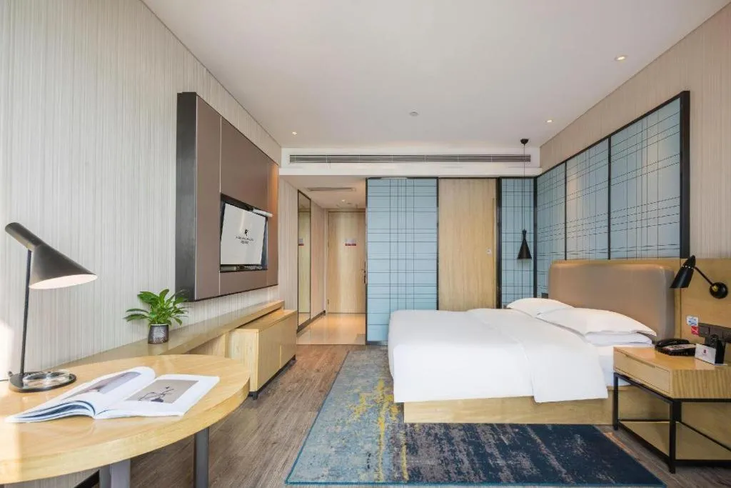 Bed in Echarm Hotel Yiyang Wanda Plaza