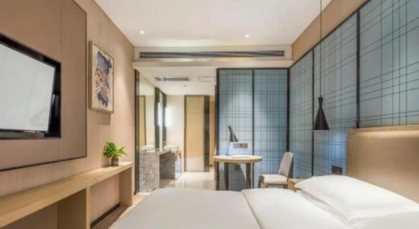 Bed in Echarm Hotel Yiyang Wanda Plaza