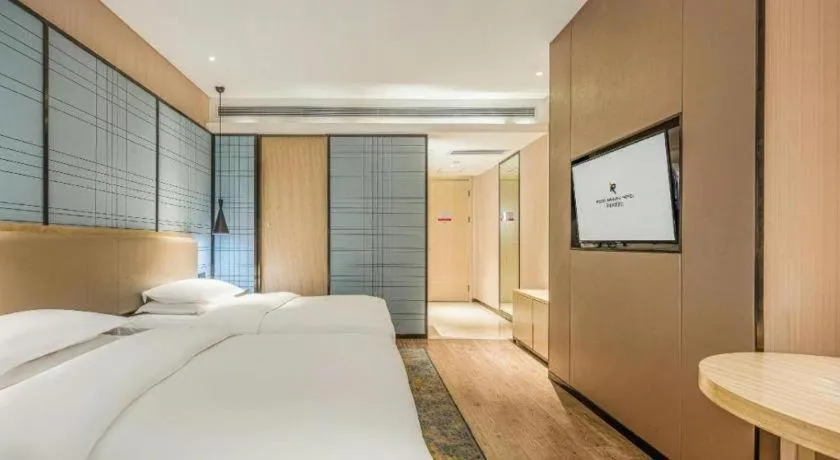 Bed in Echarm Hotel Yiyang Wanda Plaza