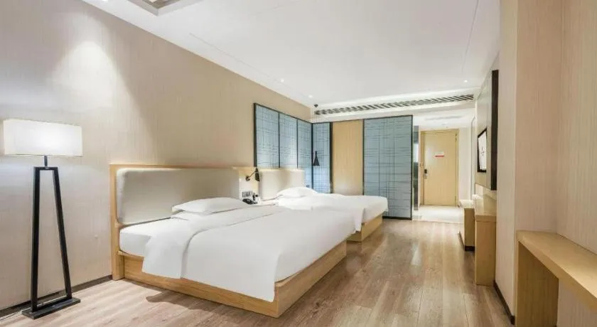 Bed in Echarm Hotel Yiyang Wanda Plaza