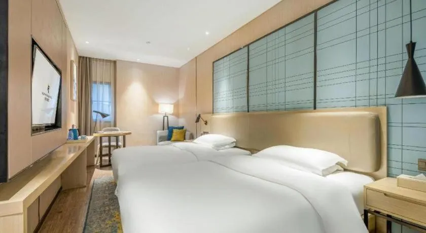 Bed in Echarm Hotel Yiyang Wanda Plaza