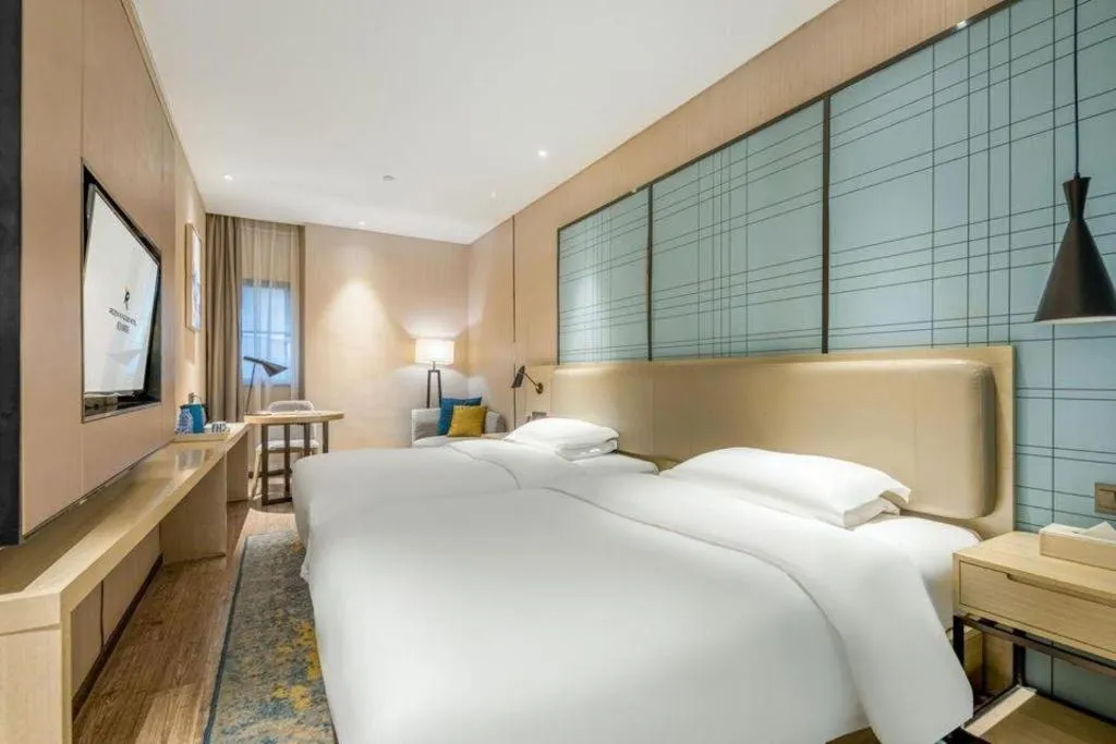Bed in Echarm Hotel Yiyang Wanda Plaza