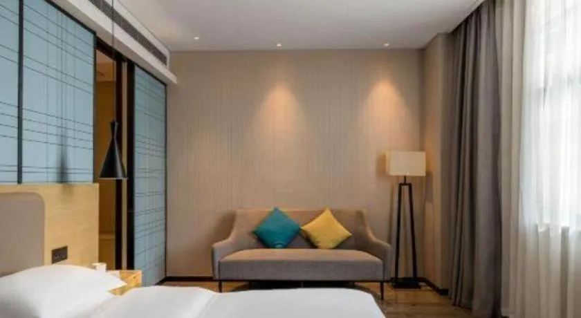 Bed in Echarm Hotel Yiyang Wanda Plaza