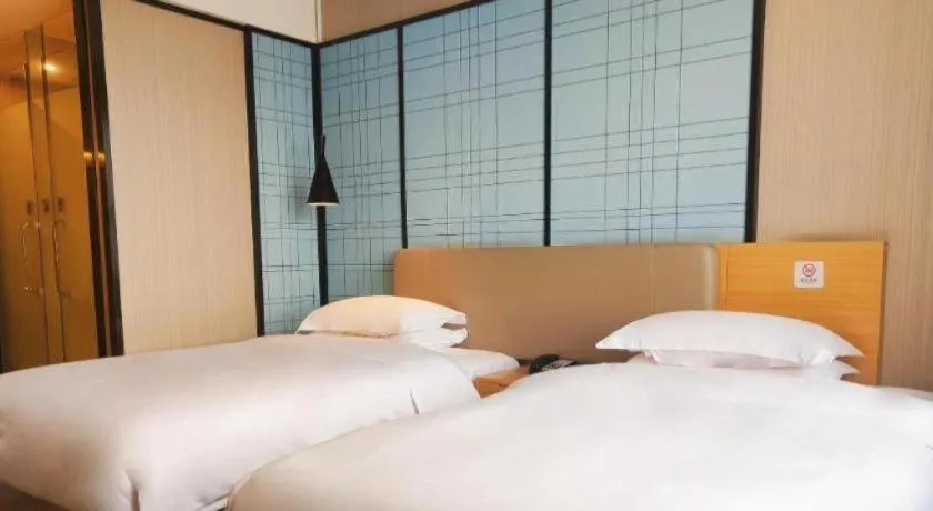 Bed in Echarm Hotel Xian Ming City Wall South Gate