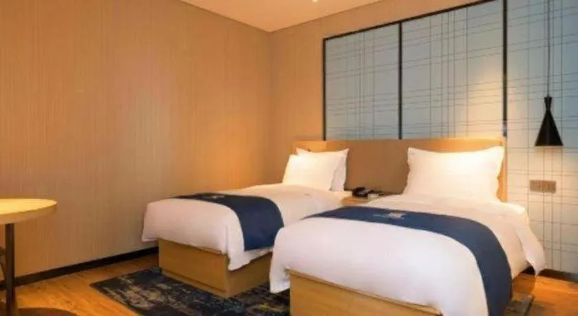 Bed in Echarm Hotel Xian Ming City Wall South Gate