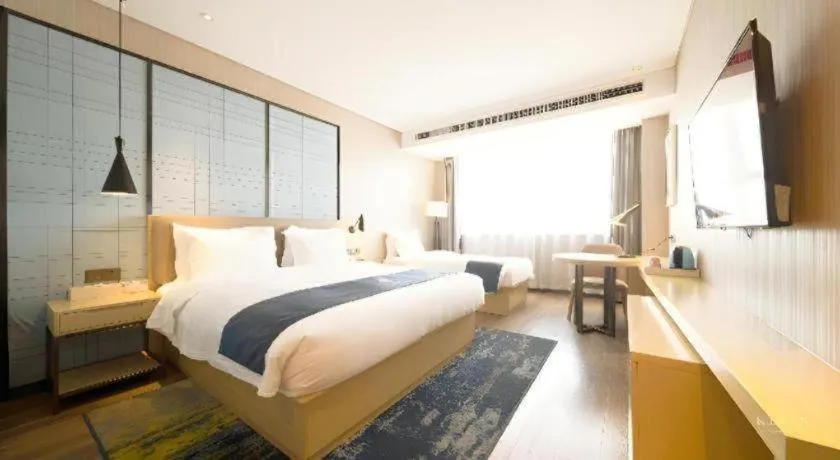 Bed in Echarm Hotel Xian Ming City Wall South Gate