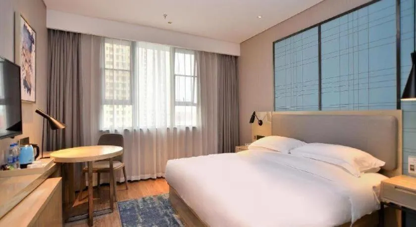 Bed in Echarm Hotel Xian Ming City Wall South Gate