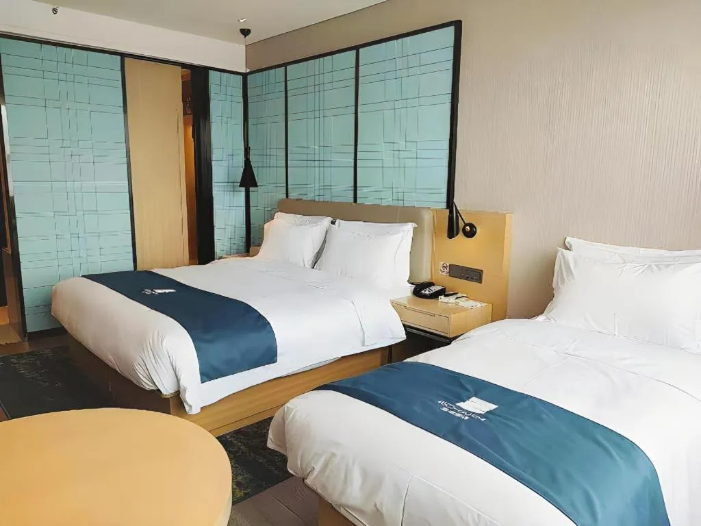 Bed in Echarm Hotel Xian Ming City Wall South Gate