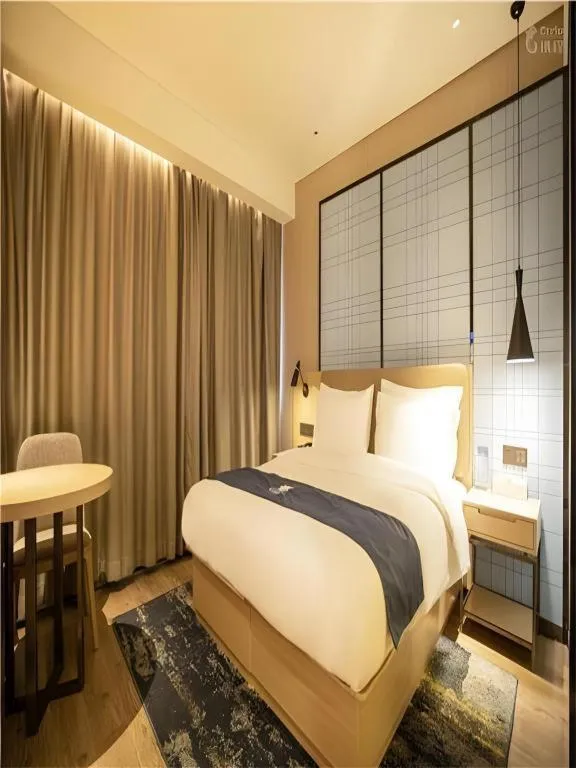 Bed in Echarm Hotel Xian Ming City Wall South Gate