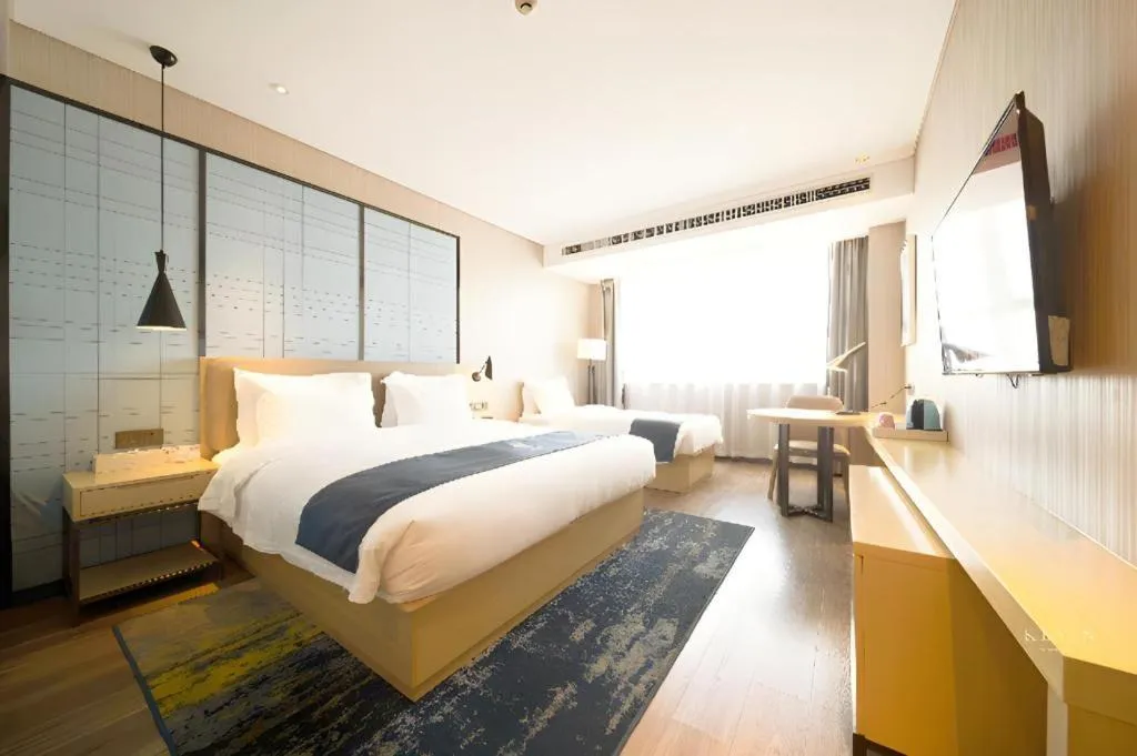 Bed in Echarm Hotel Xian Ming City Wall South Gate