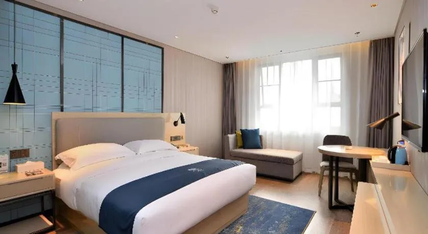 Bed in Echarm Hotel Xian Ming City Wall South Gate