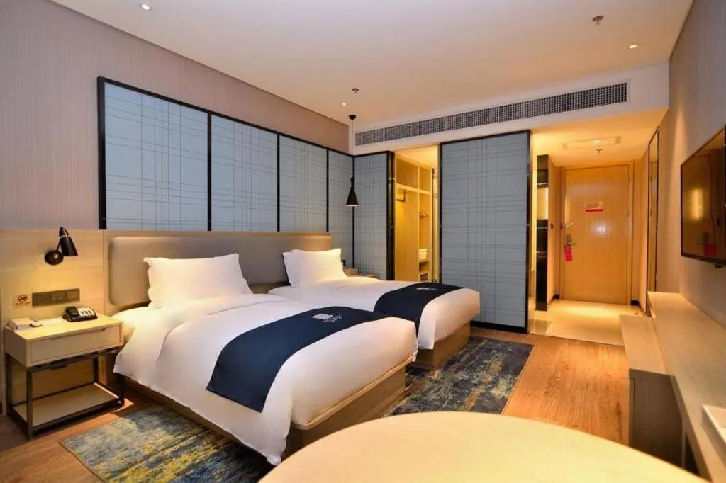 Bed in Echarm Hotel Xian Ming City Wall South Gate