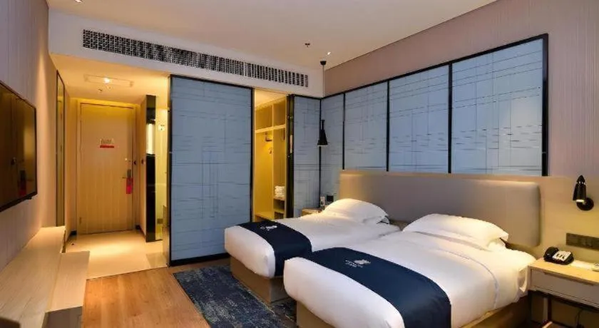 Bed in Echarm Hotel Xian Ming City Wall South Gate