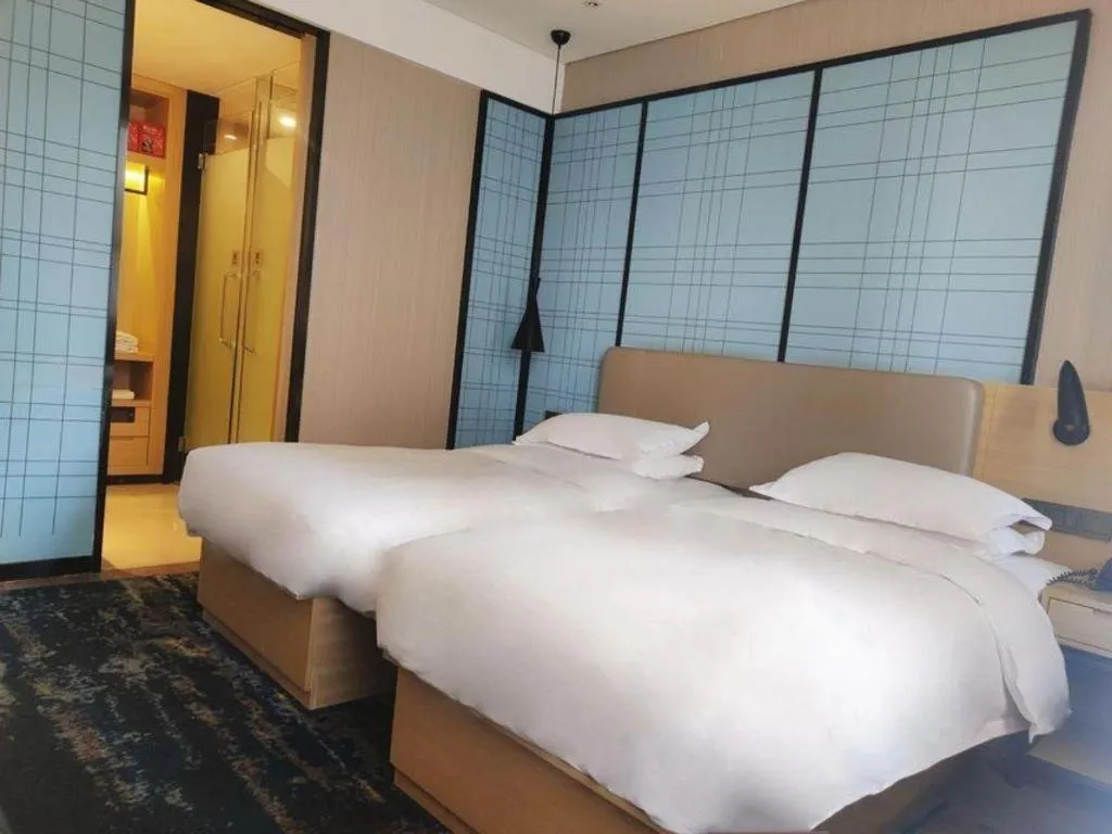 Bed in Echarm Hotel Xian Ming City Wall South Gate