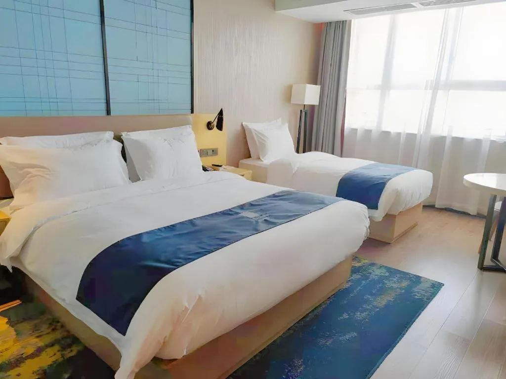 Bed in Echarm Hotel Xian Ming City Wall South Gate