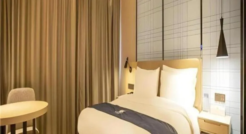 Bed in Echarm Hotel Xian Ming City Wall South Gate