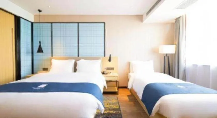 Bed in Echarm Hotel Xian Ming City Wall South Gate