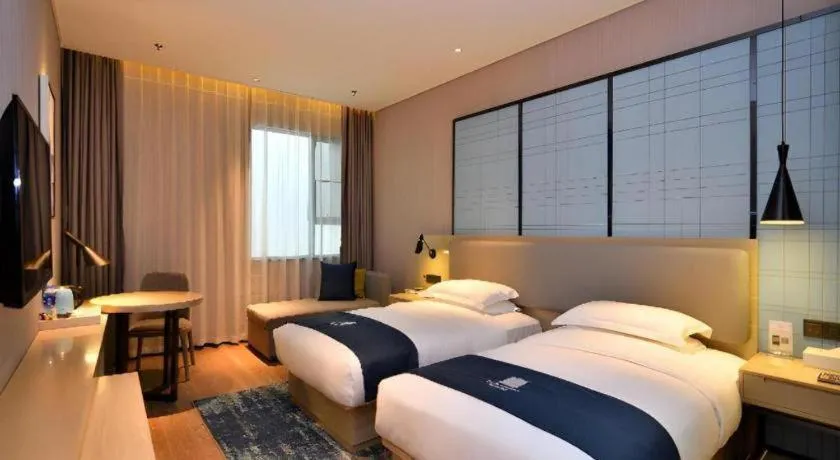 Bed in Echarm Hotel Xian Ming City Wall South Gate