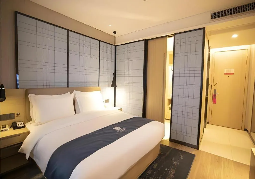 Bed in Echarm Hotel Xian Ming City Wall South Gate